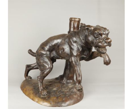 A dark patinated brond depicting a fighting dog on a chain. 2nd half of the 20th century.H.: 50 x B.: 60 cm.