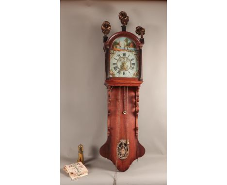 A "Frisian" hanging clock with alarm function.