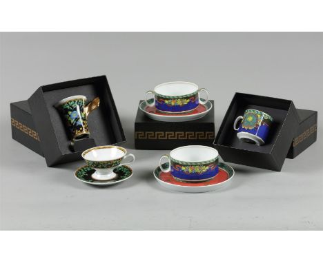 A lot of porcelain consisting of three cups and saucers with Le Roy Soleil decor, added two cups and saucers with gold roy de