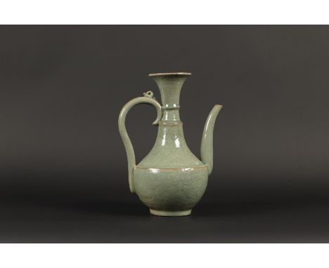 A celadon pitcher. Korea, 15th century or later.H.: 28,5 cm.