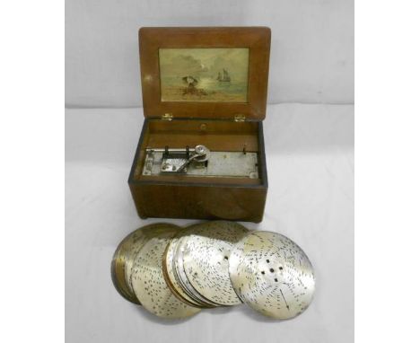 Edwardian Polyphon/Music Box in 1/4 veneered walnut case, inside lid set with print of shore scene, with key & 19 x 7" discs 