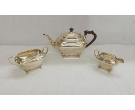 Silver 3 Piece Tea Set: teapot, sugar & milk with composition handles & finial, slightly tapering canted corner rectangular b