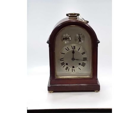 An early 20th century mahogany mantle clock with westminster chime