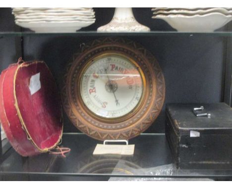oak framed circular barometer; together with an Opera hat