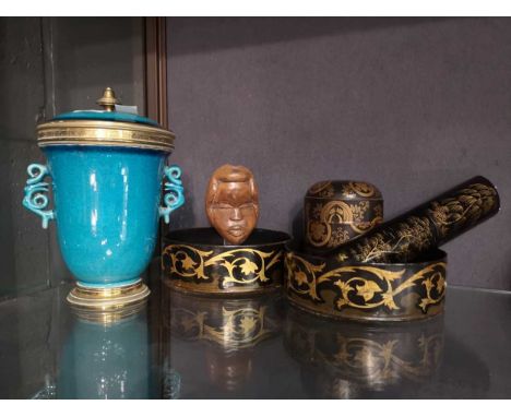 A wood carved Tribal mask on stand; a 19th century Japanese black lacquer and gilt decorated domed box and cover, 10cm high; 