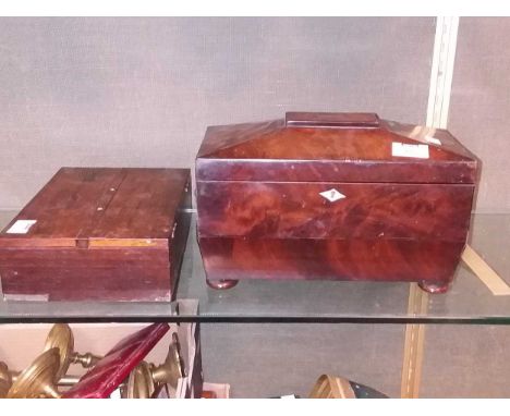 A Regency mahogany tea caddy of sarcophagus shape and a rosewood desk box (lacking handle) (2)