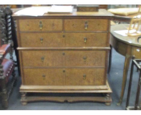 A walnut chest of drawers on later stand, 105x102x57cm