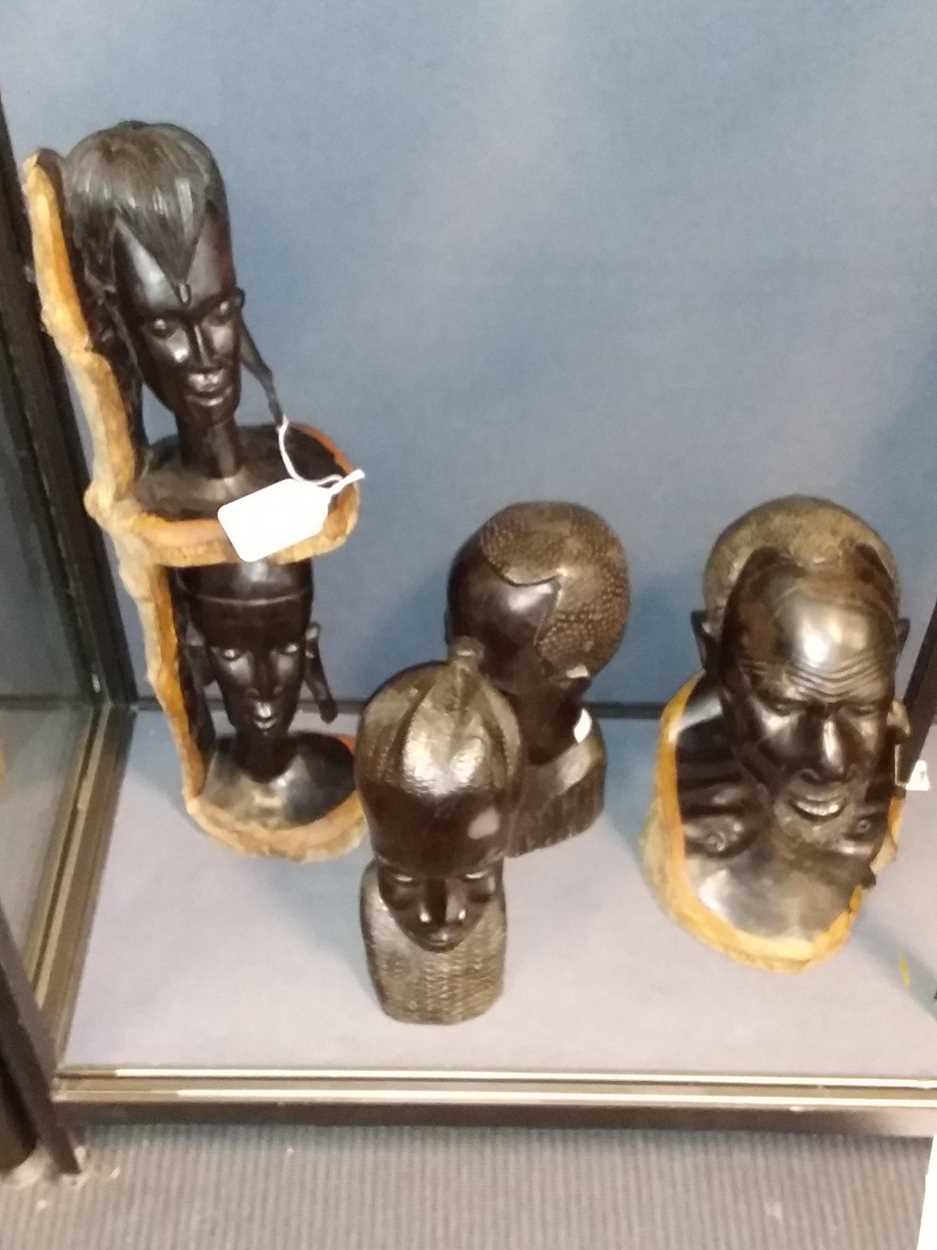 Five African ebony carved heads in Cheffins Fine Art