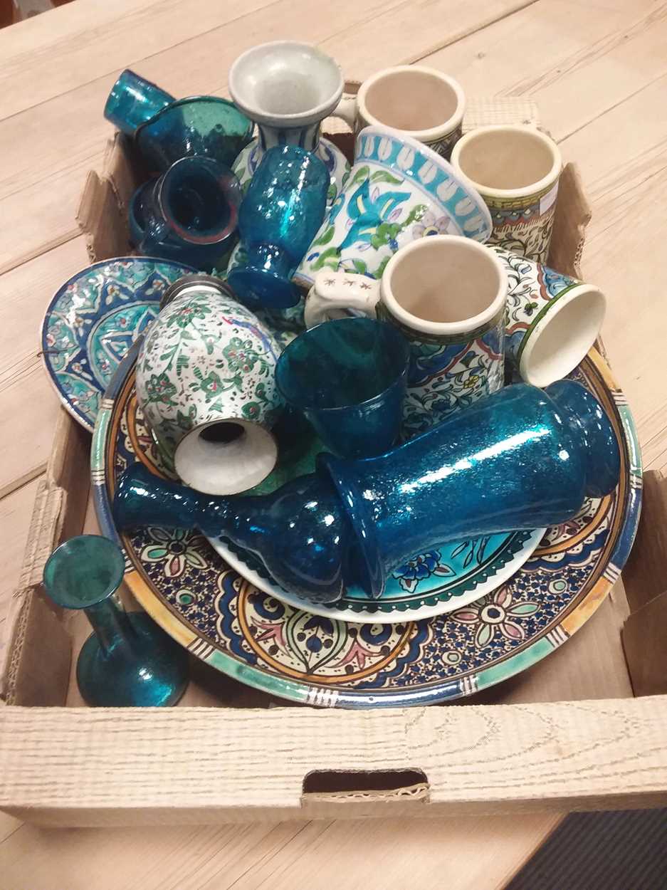 A collection of middle eastern pottery and glassware together with