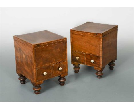 each with hinged covers with brass button catches, faux escutcheons and two small drawers with turned ivory handles raised on