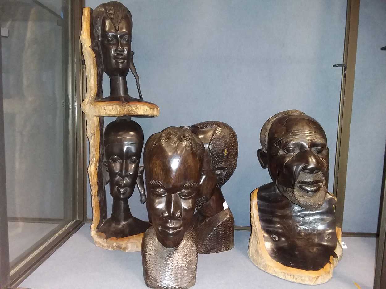 Five African ebony carved heads in Cheffins Fine Art