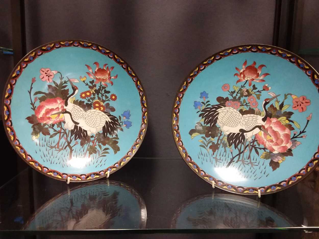 A pair of mid 20th century cloisonne plates decorated with cranes in Cheffins Fine Art