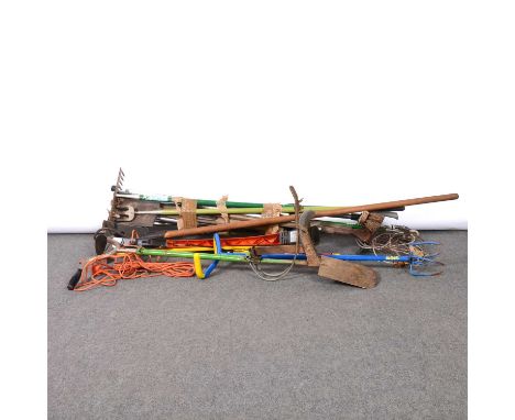 Quantity of garden hand tools, including rakes, forks, spade assister, etc