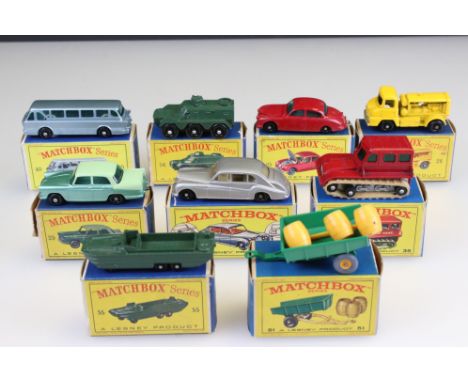 Nine boxed Matchbox 75 Series diecast models to include 65 Jaguar 3.8 Sedan in dark red, 35 Snow Trac, 29 Austin A55 Cambridg