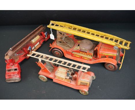 Three vintage tin plate fire engines to include GT. Britain engine with extending ladder etc, heavy play wear 