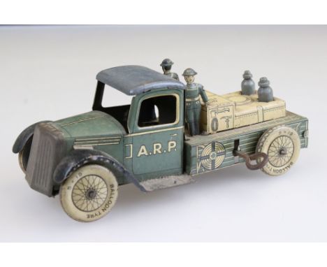 Clockwork ARP Air Raid Precautions model with both figures and both bottle accessories, dusty and showing wear, unmarked 