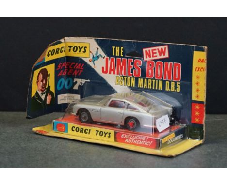 Boxed Corgi 270 The New James Bond Aston Martin diecast model, complete with ejector figure and secret instructions (paper ba