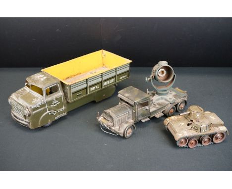 Three tin plate military models to include Marx Royal Artillery truck, Gama Tank (Germany) and an unmarked truck with searchl