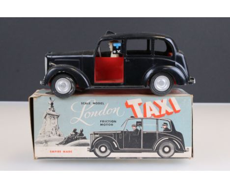 Boxed Fairylite plastic scale model London Taxi with friction motor, gd with some play wear, box tatty but fair 