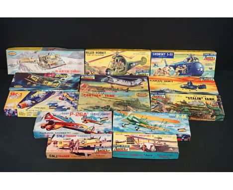 13 Boxed &amp; Unbuilt Aurora plastic model kits to include 8 Famous Fighters (309-.98 German "Panther" Tank, 303-.98 Russian