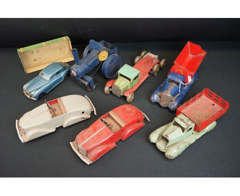Seven circa mid 20th C tin plate models to include Rolls Royce in metallic blue, British made steam roller in blue etc, play 