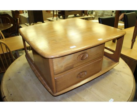 Light Ercol Pandora's Box coffee table