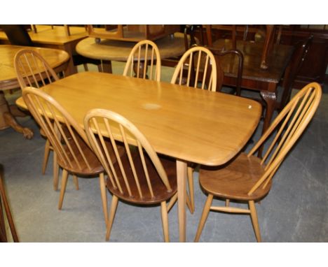 Light Ercol dining table & 6 chairs