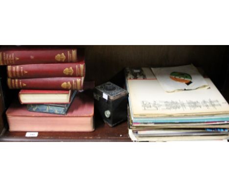 A collection of records together with a camera, books etc