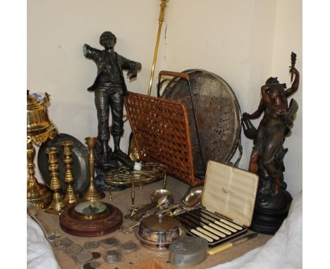 A pair of spelter figures together with brass candlesticks, brass wares, barometer, magazine rack, electroplated flatwares, c