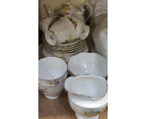 A Royal Albert bone china floral decorated part tea service