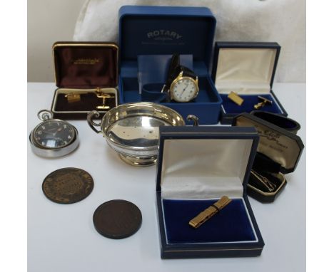 A Rotary wristwatch, the circular dial with Arabic numerals and date aperture at 3, on a leather strap, boxed, together with 