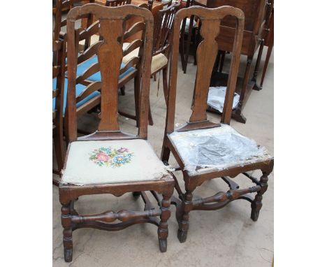 A reproduction mahogany coffee table, a gilt wall mirror and prints together with a pair of 18th century oak dining chairs