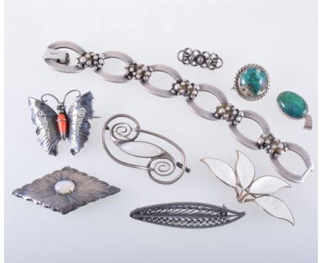 A collection of Scandinavian and similar jewellery, a David Anderson Norwegian white enamel four leaf brooch, a 925 oval link
