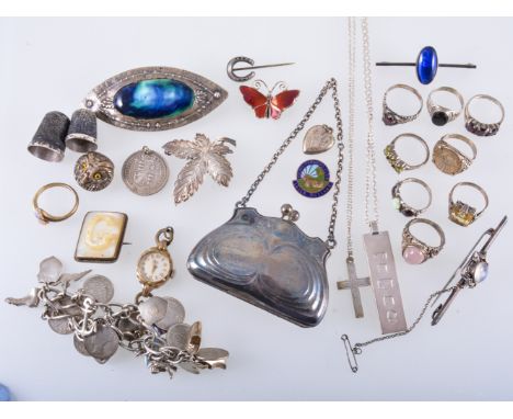 A collection of jewellery and a small silver purse, hallmarked Birmingham 1909, a charm bracelet, a Norwegian silver gilt and