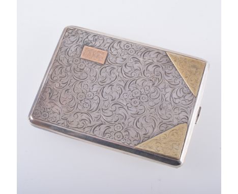A white metal cigarette case stamped 900 and makers name in Cyrillic, engine turned design to one side and floral and scroll 