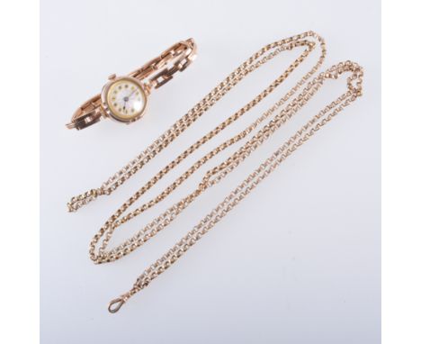 A yellow metal guard chain, faceted belcher links, 140cm long, pad stamp marked 9c, fittted with a swivel fastener, approxima