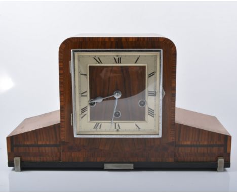 Walnut cased mantel clock, silvered chapter ring, Westminster striking movement on five gongs, width 40cm; a Metamec; a stain