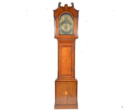 A Georgian mahogany longcase grandfather clock, boxwood stringing and shell motif inlay, arched brass dial, brass chapter rin
