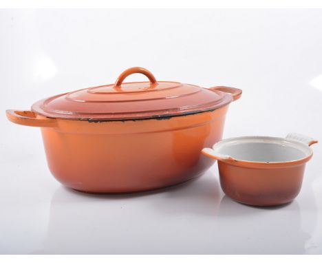Cookware, including cast iron wares in the style of Le Creuset, vintage scales and other pans, two boxes.