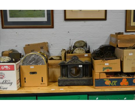 Collection of clock parts, cases, longcase clock dials, and related items.