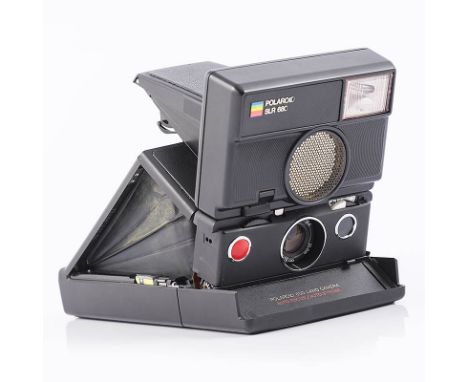Polaroid SLR 680 Land camera, with flash attachment, leather carry case and one pack of unopened 600 film. 
