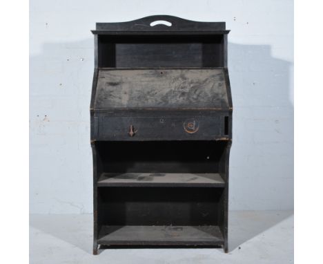 Edwardian black oak bureau, shelf over the fall front, single drawer below, width 79cm, height 132cm.