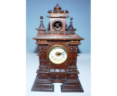 A late 19th century Austrian cuckoo mantel clock in architectural oak case, 32cm highcondition: finial detached and bellows w