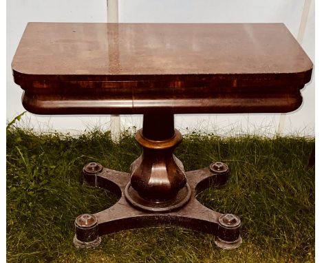 A William IV mahogany card table, circa 1835, twist open top, enclosing an inlaid card playing surface on a deep frieze, tuli