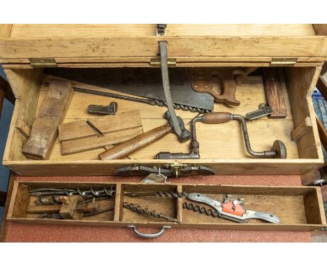 A Victorian / Edwardian pine tool chest, hinged cover opening to reveal various woodworking and other tools, including Henry 