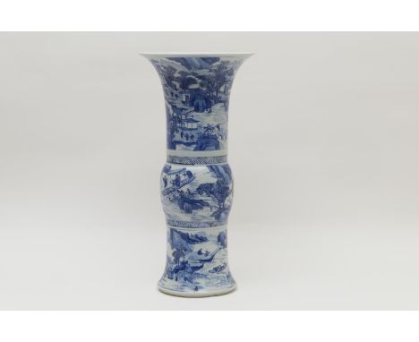 Chinese blue and white Gu beaker vase, Kangxi (1662-1722), decorated in three sections with continuous landscapes, the base m