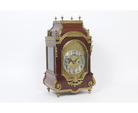 French mahogany and ormolu bracket clock, circa 1900, the case of architectural form with a brass face with silvered chapter 