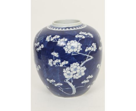Large Chinese blue and white ginger jar, 18th or 19th Century, decorated with prunus blossom against a blue ground, painted K