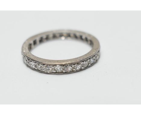 Diamond eternity ring, the small round cut stones channel set in platinum, size K, gross weight approx. 2.9g 