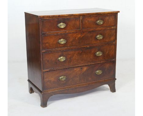 Late Regency mahogany chest of drawers, circa 1820-30, fitted with two short and three long graduating drawers with later ova